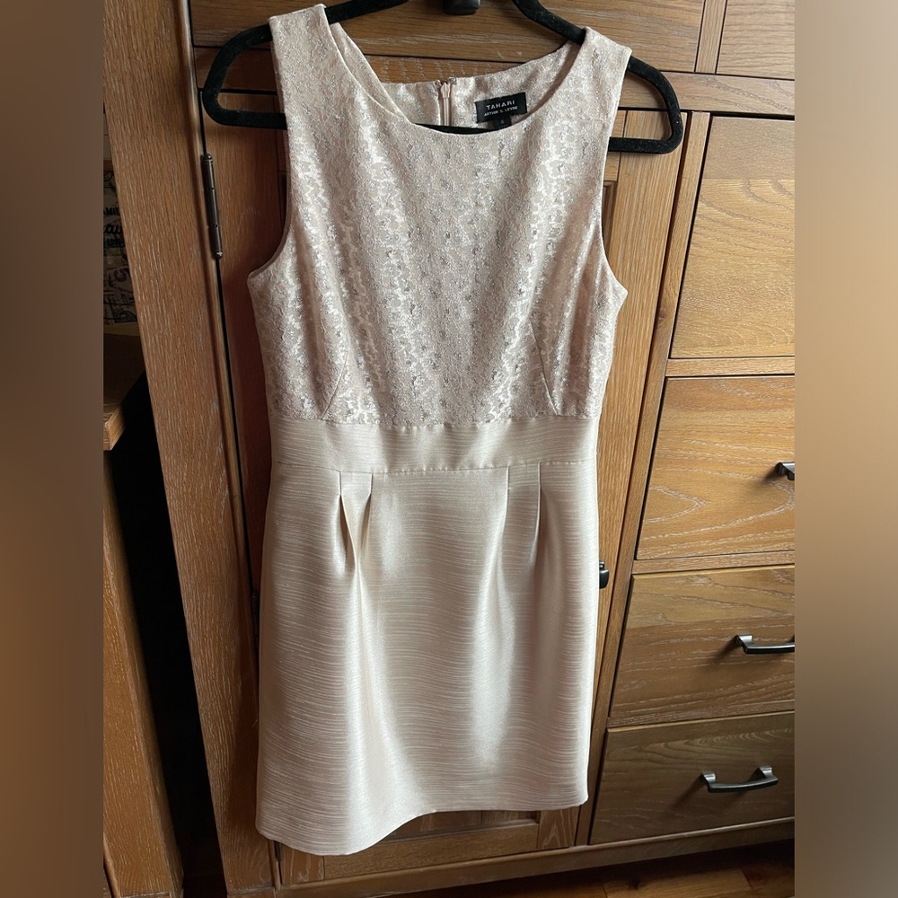 Like brand new! It’s classy cream color and has a gorg shimmer.